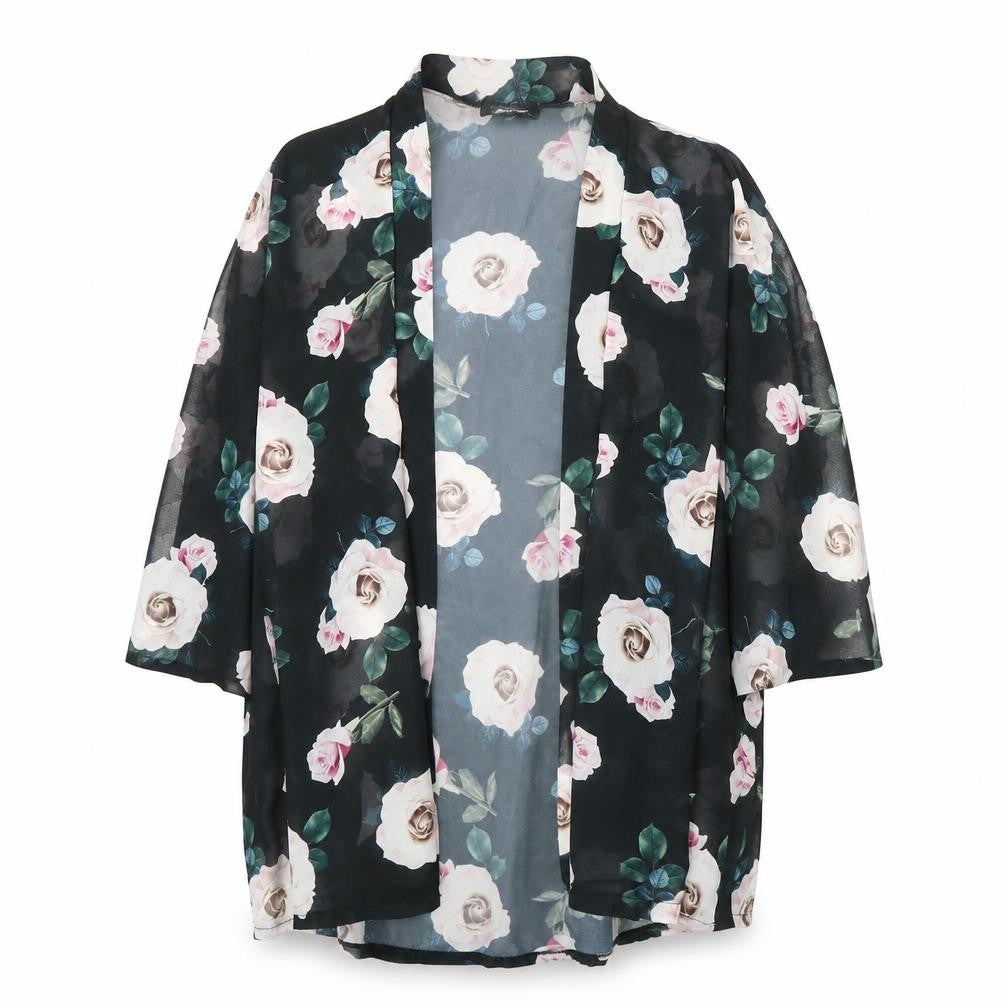 Front view of Boohoo women’s black floral jacket, size UK 20