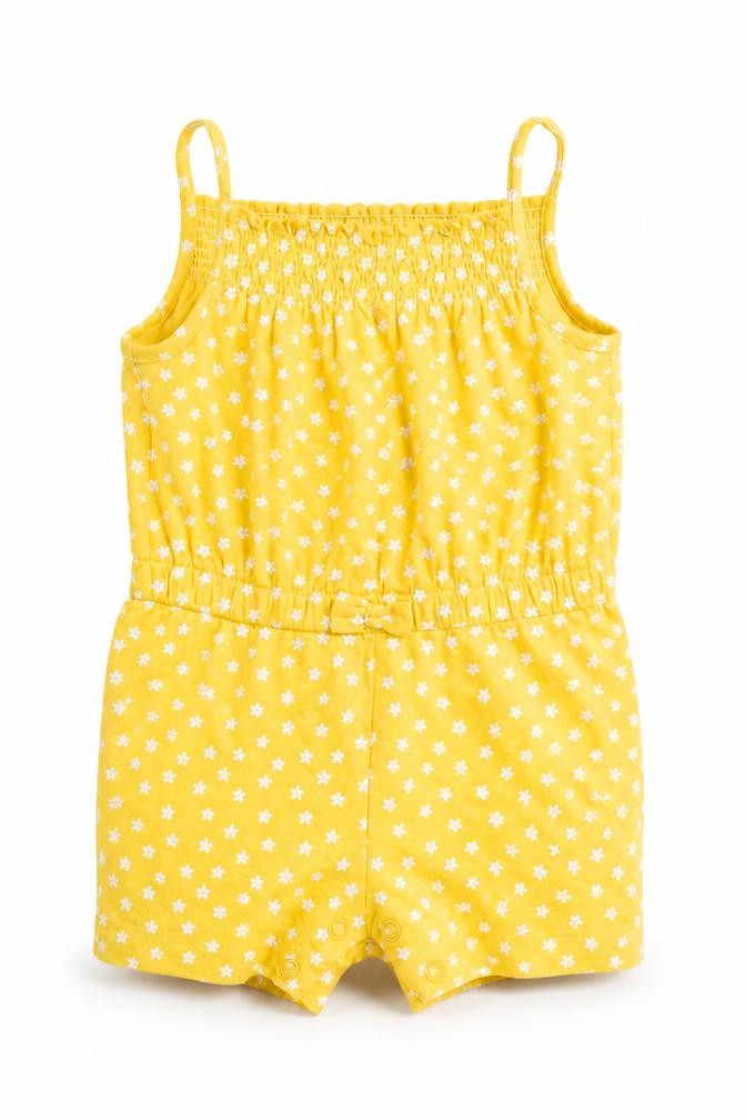 Front view of Primark girls’ yellow floral romper one-piece, size 6-9, months