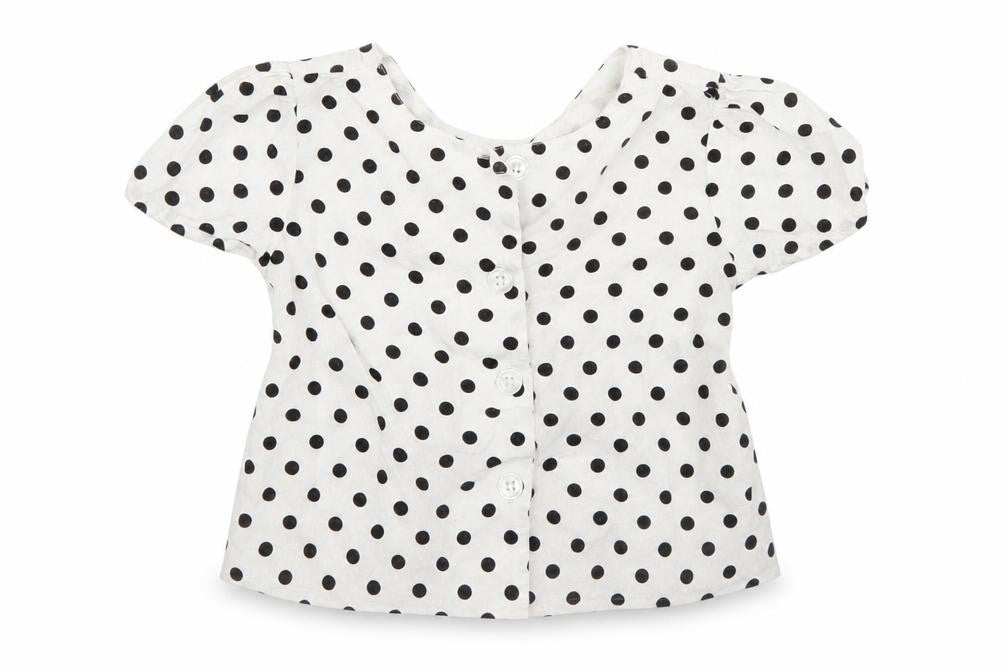 Front view of M&Co girls’ white polka dot basic blouse, size 5-6, years