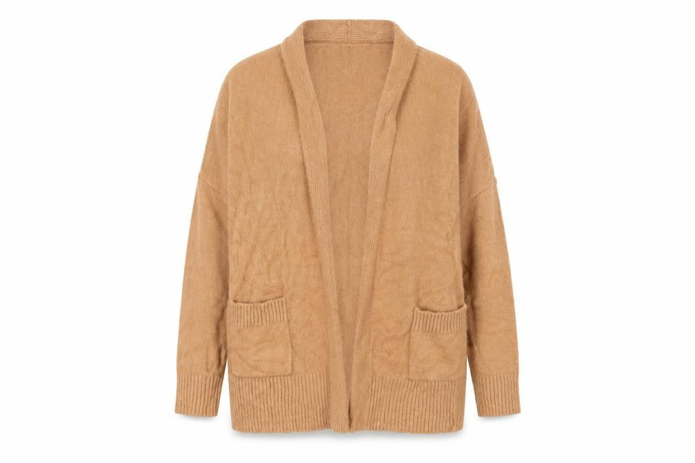 Front view of Primark women’s beige knit cape jumper, size UK 14