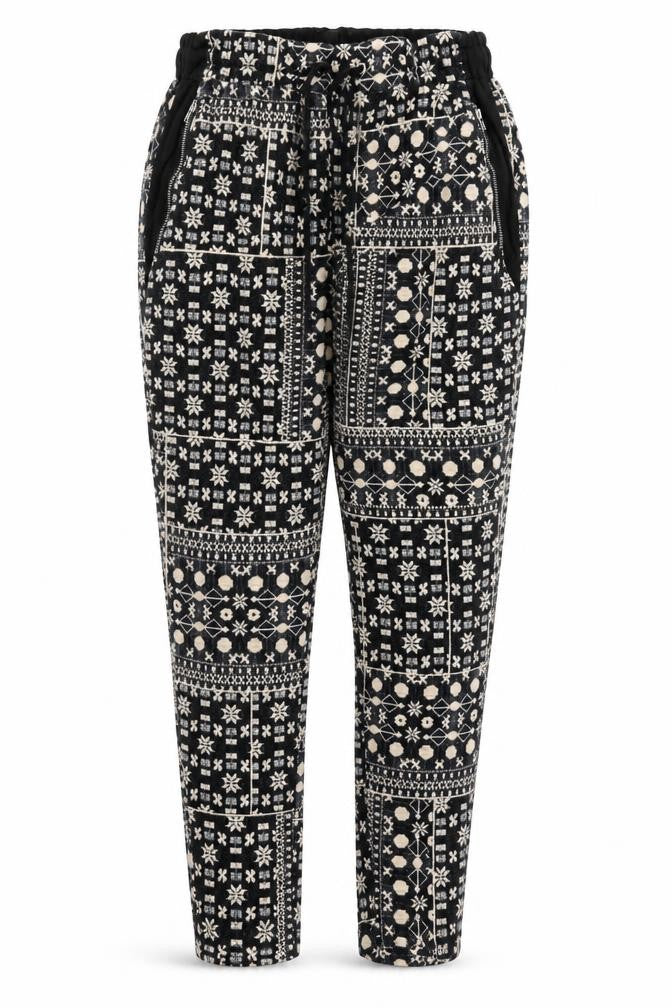Front view of H&M women’s black geometric jogger trousers, size S, 29-inch leg