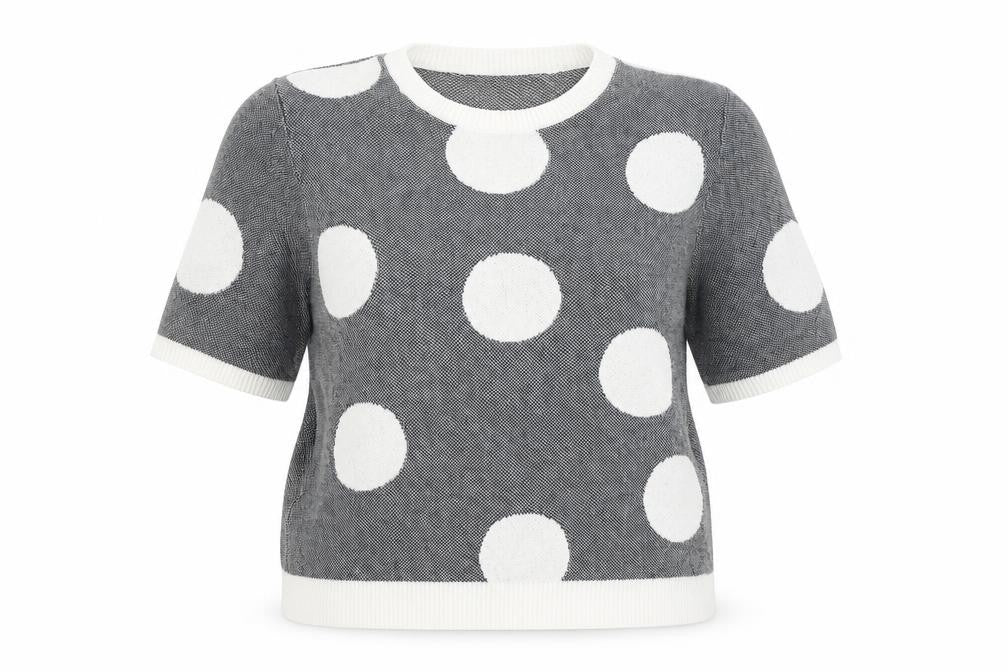Front view of Marks & Spencer women’s blue polka dot jumper, size UK 18