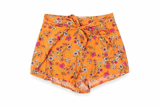 Front view of Cotton On girls’ orange floral shorts, size 11, years