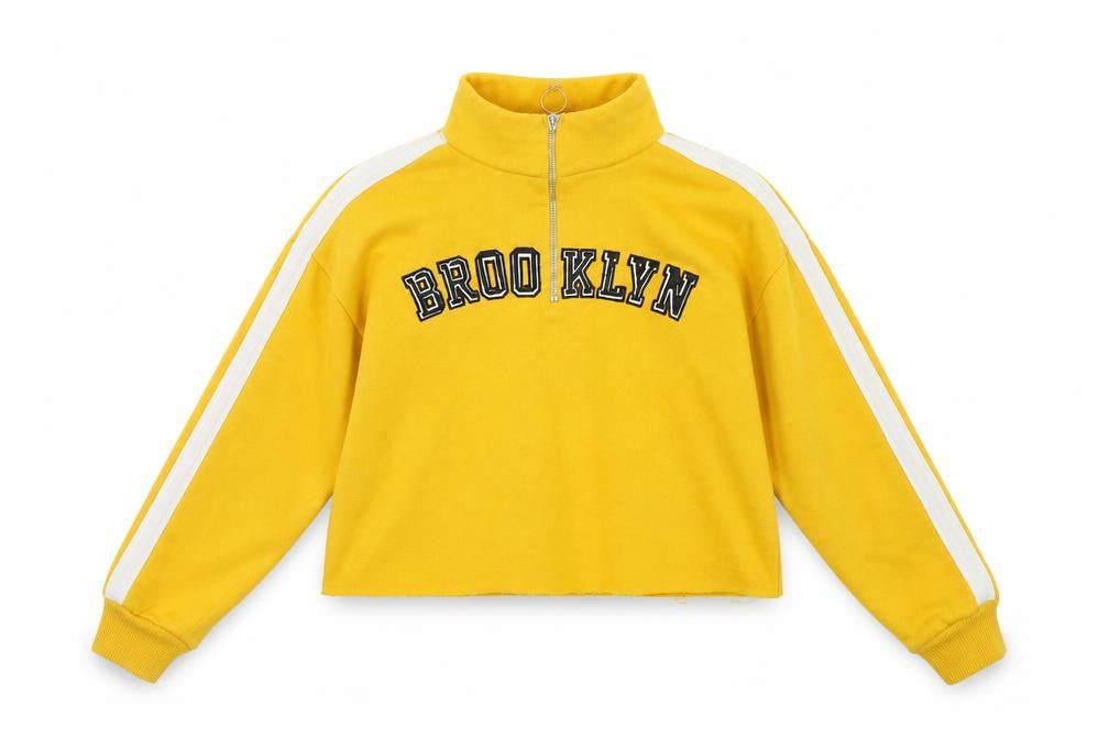Front view of Candy Couture women’s yellow pullover sweatshirt, size UK 10