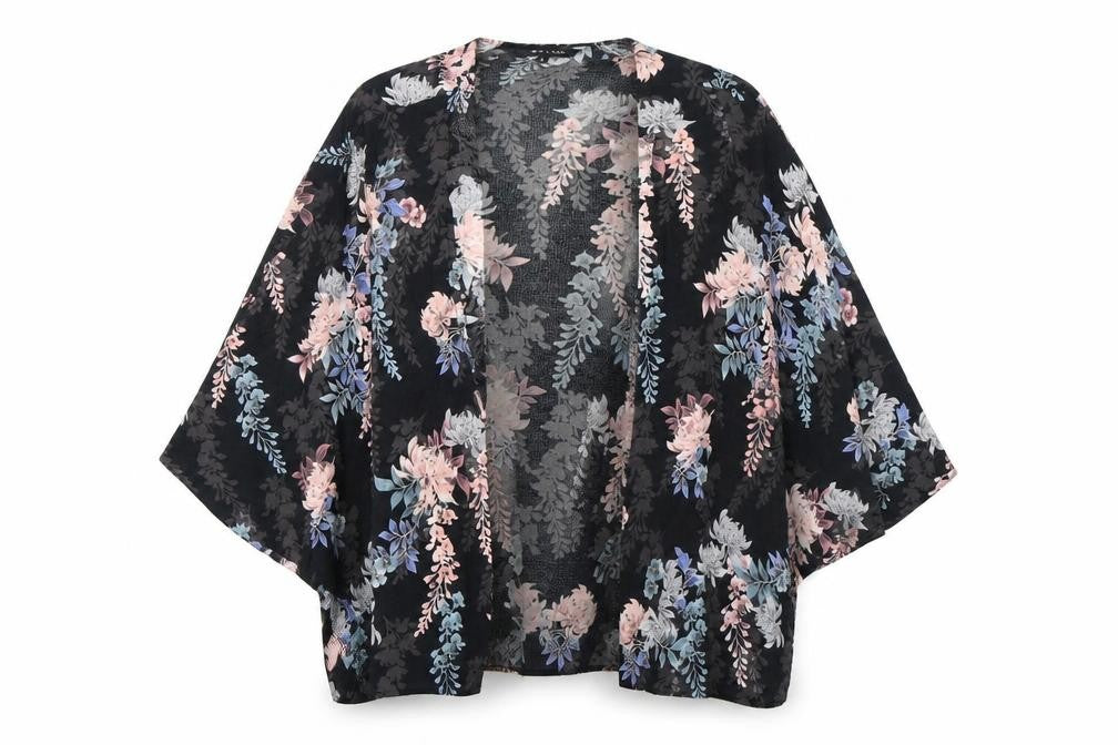 Front view of New Look women’s black floral wrap blouse, size UK 12