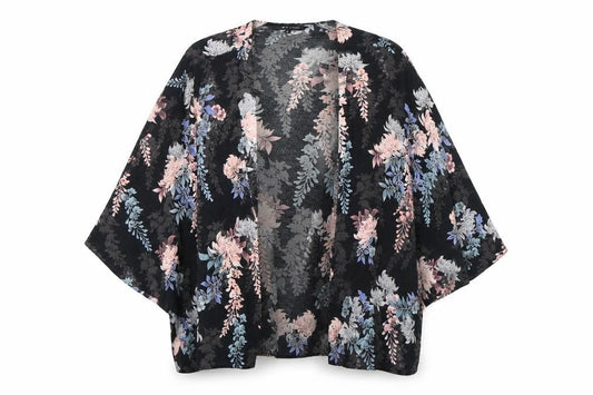 Front view of New Look women’s black floral wrap blouse, size UK 12