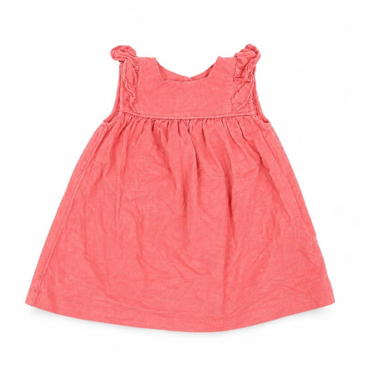 Front view of Marks & Spencer girls’ orange corduroy a-line, size 9-12, months