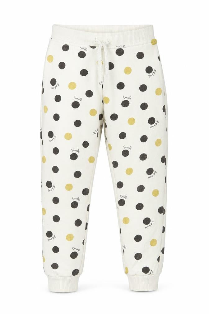 Front view of Primark girls’ white polka dot jogger trousers, size 2, years