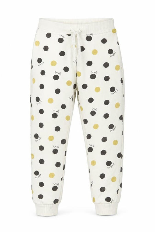 Front view of Primark girls’ white polka dot jogger trousers, size 2, years