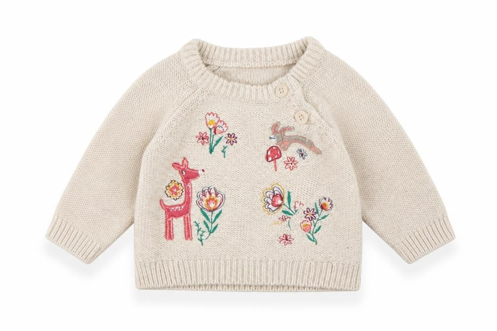 Front view of Nutmeg girls’ beige floral jumper, size 0-3, months