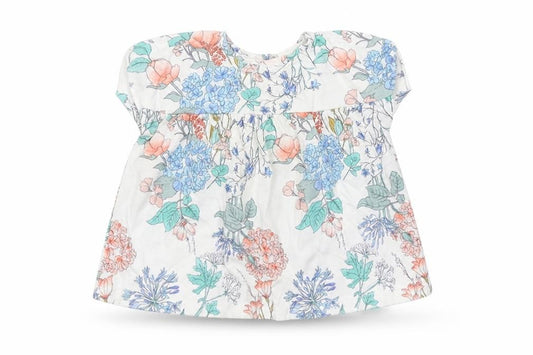 Front view of Next girls’ white floral a-line, size 3-6, months