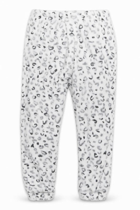 Front view of Love Sleep girls’ white animal print jogger trousers, size 8-9, years