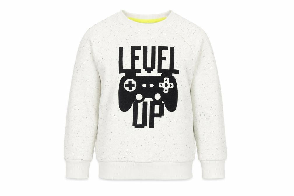 Front view of F&F girls’ white jumper, size 6-7, years