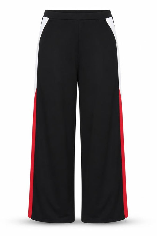 Front view of PRETTYLITTLETHING women’s black sweatpants, size UK 12, 28-inch leg - split down sides