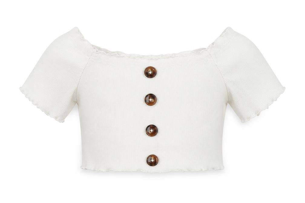 Front view of SHEIN girls’ white cropped blouse, size 7, years