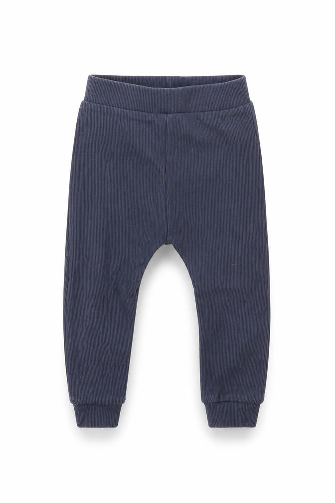 Front view of Tu girls’ blue jegging trousers, size 2, years