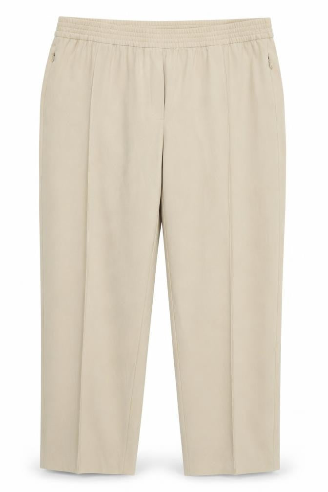 Front view of Marks & Spencer women’s beige trousers, size UK 22, 26-inch leg