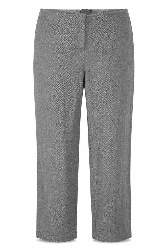 Front view of Marks & Spencer women’s black geometric trousers, size UK 14, 29-inch leg