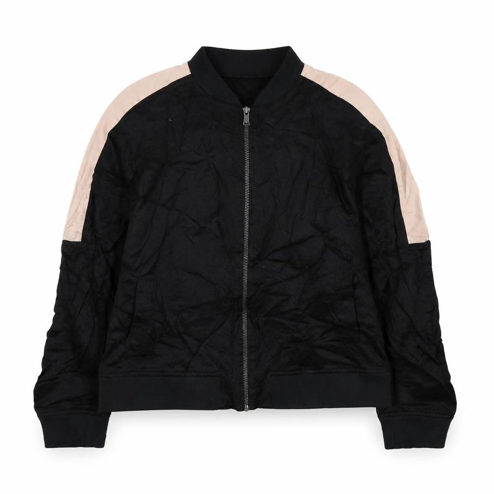 Front view of Light Before Dark girls’ black colourblock jacket, size L