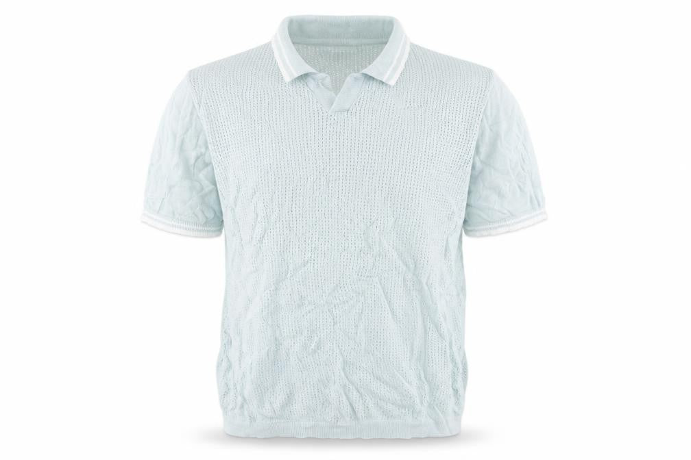 Front view of Duck and Cover men’s green polo, size L