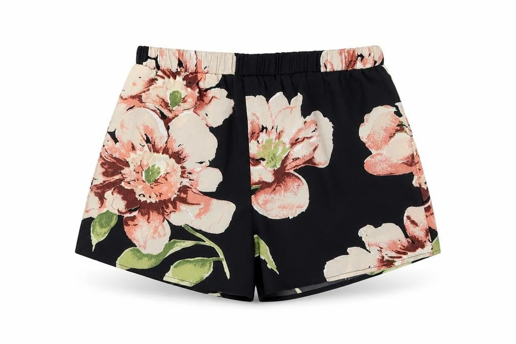 Front view of SHEIN women’s black floral bermuda shorts, size XS