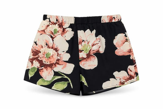 Front view of SHEIN women’s black floral bermuda shorts, size XS