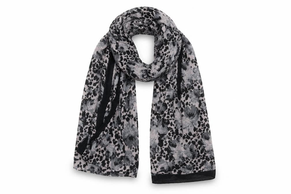 Front view of Preworn women’s black geometric shawl/wrap