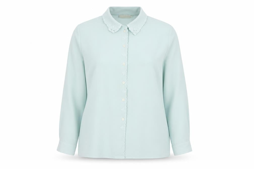 Front view of EWM women’s green basic button-up, size UK 18