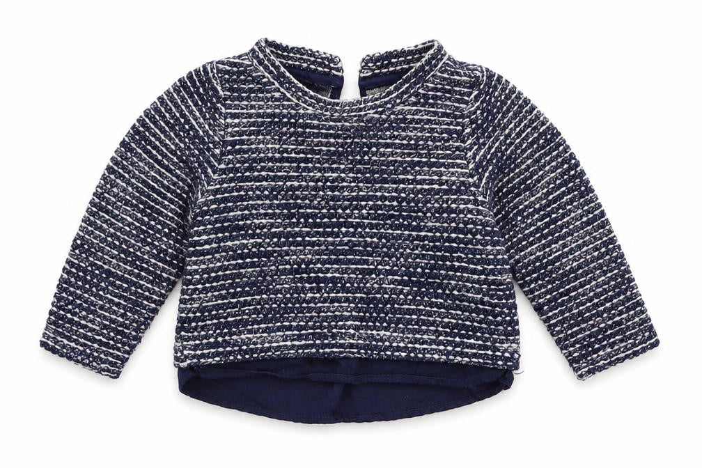 Front view of Dunnes girls’ blue jumper, size 3, years