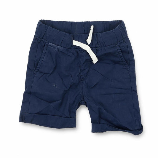 Front view of H&M boys’ blue cropped trousers, size 2, years