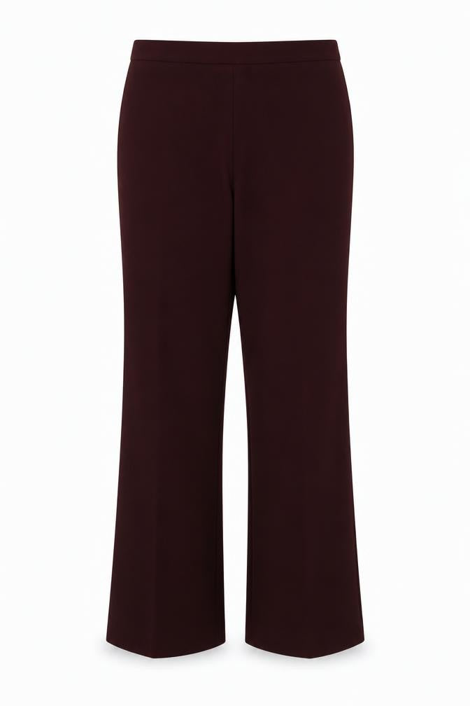 Front view of Marks & Spencer women’s red trousers, size UK 16, 26-inch leg