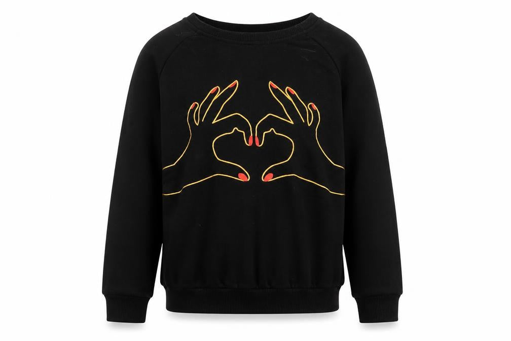 Front view of SHEIN girls’ black jumper, size 10, years