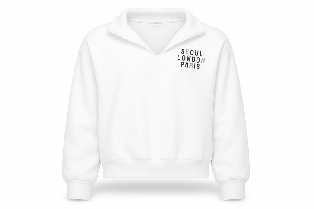 Front view of H&M girls’ white jumper, size 12, years