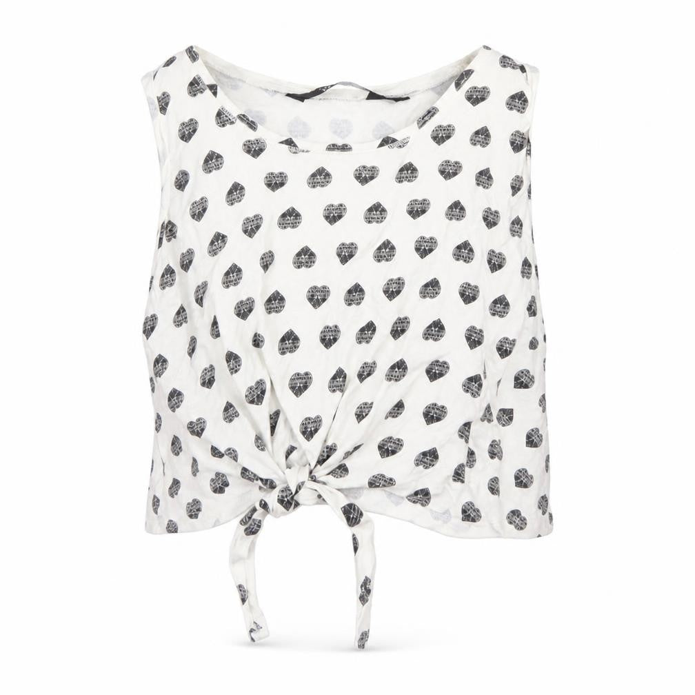 Front view of New Look girls’ white spotted basic tank, size 9, years
