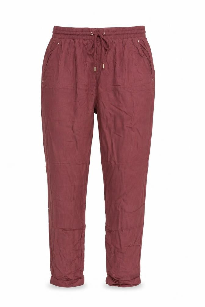 Front view of New Look women’s red trousers, size UK 10, 27-inch leg