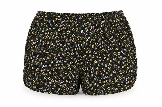 Front view of Primark girls’ black floral hot pants shorts, size 10-11, years