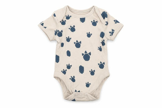 Front view of George Baby Beige Animal Print Babygrow One-Piece, size 3-6, Months - Dinosaur Print