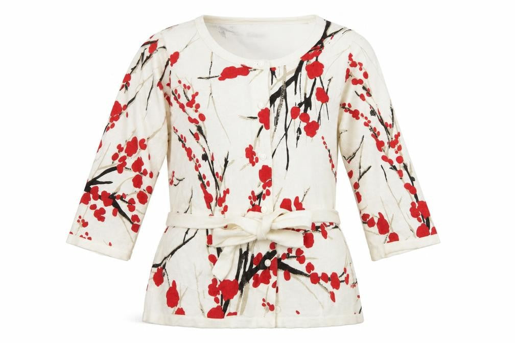 Front view of Minuet women’s ivory floral knit cape jumper, size UK 12