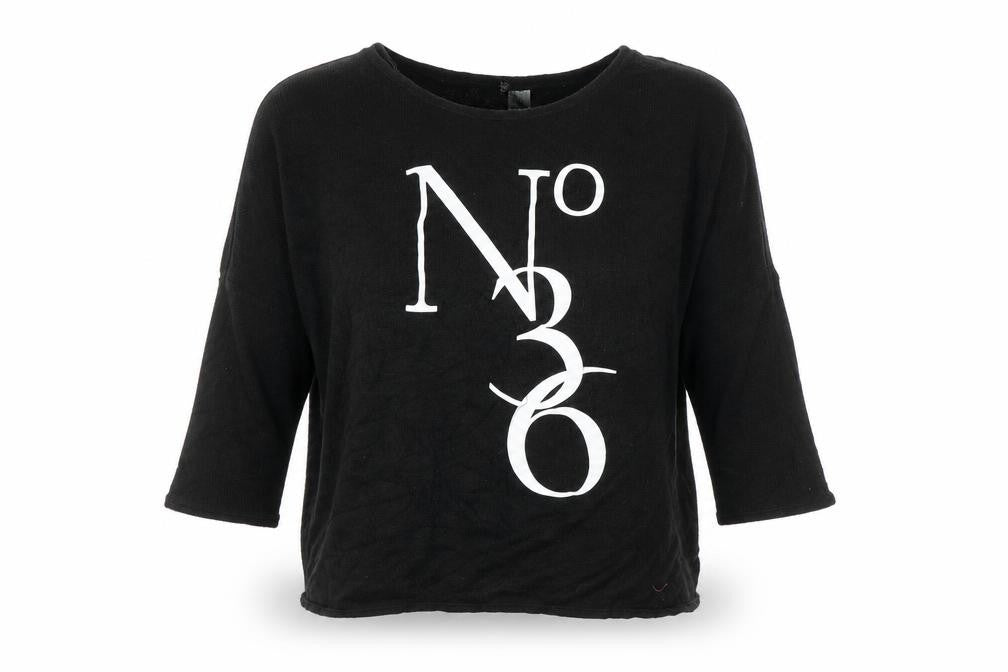 Front view of H&M women’s black basic blouse, size S