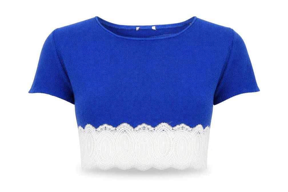 Front view of Preworn women’s blue cropped polo, size M