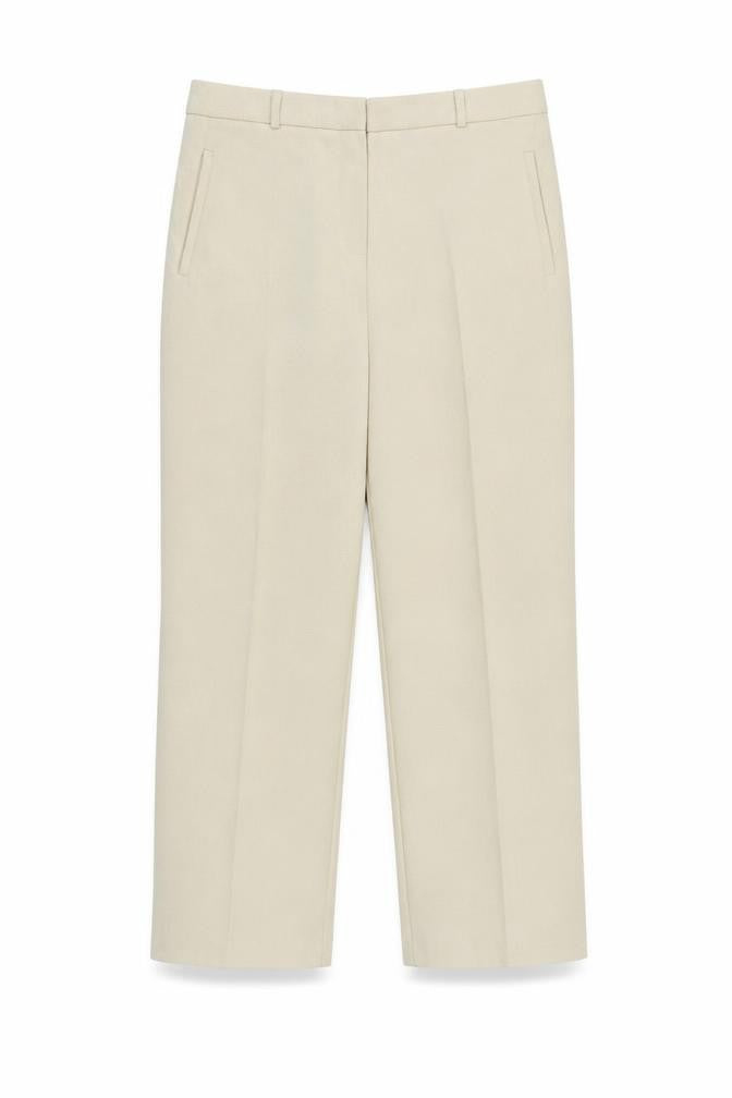 Front view of BHS women’s ivory trousers, size UK 14, 26-inch leg