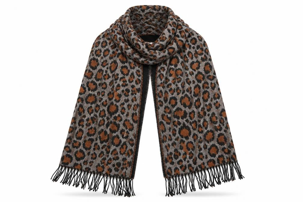 Front view of Tu women’s multicoloured animal print shawl/wrap