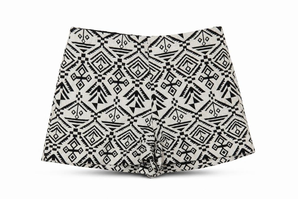 Front view of Miss Selfridge women’s white geometric hot pants shorts, size UK 10