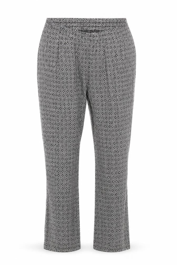Front view of H&M women’s multicoloured geometric trousers, size M, 24-inch leg
