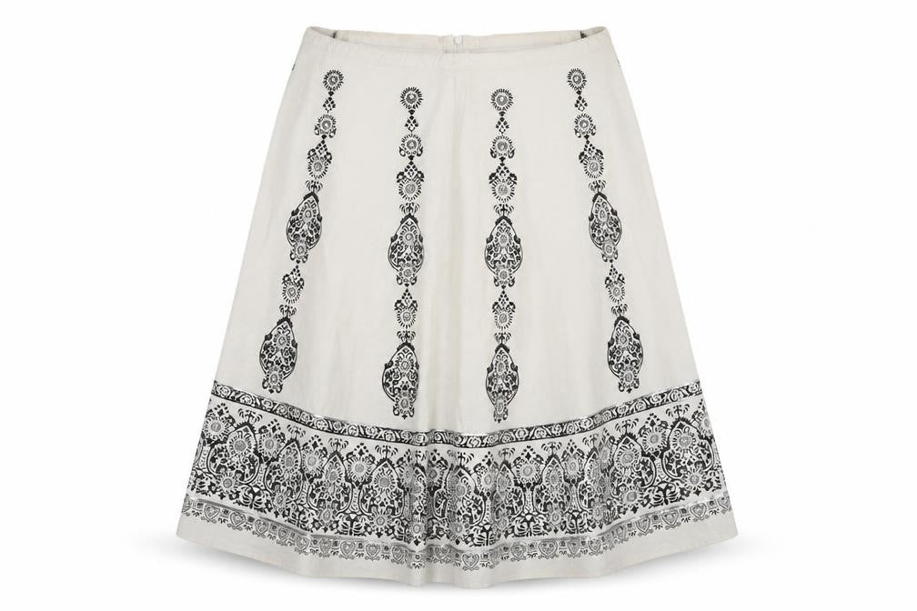 Front view of Preworn women’s white flare skirt, size UK 32, in