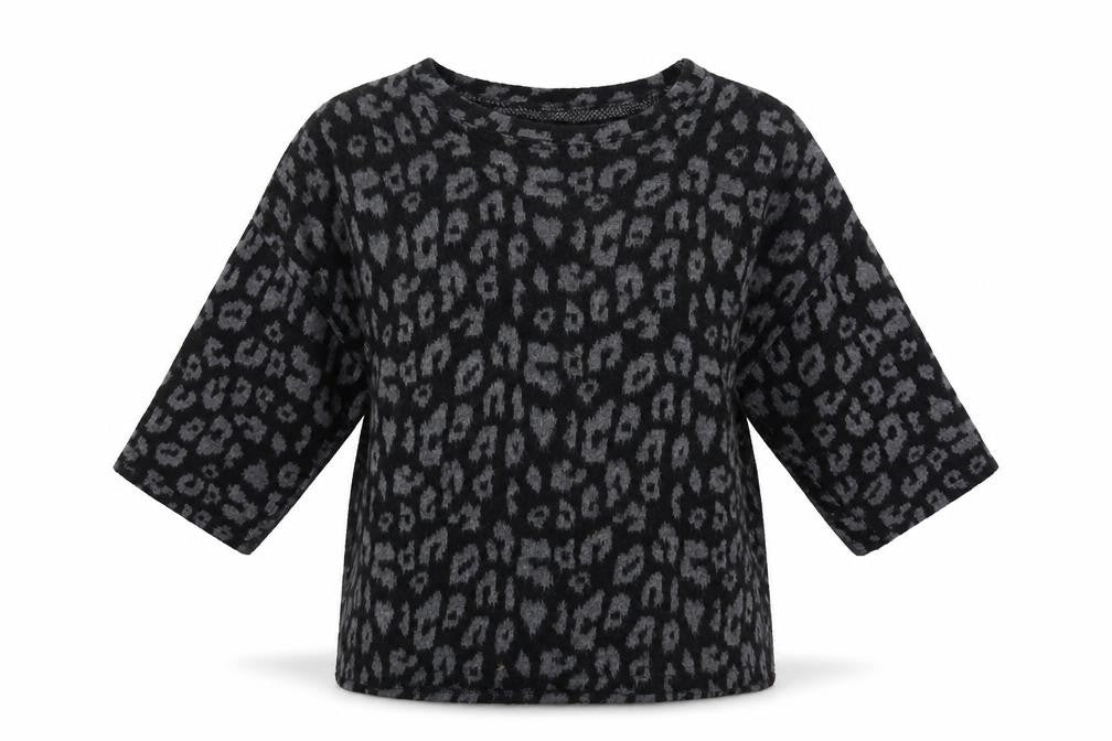 Front view of Prodotto women’s black animal print jumper one size
