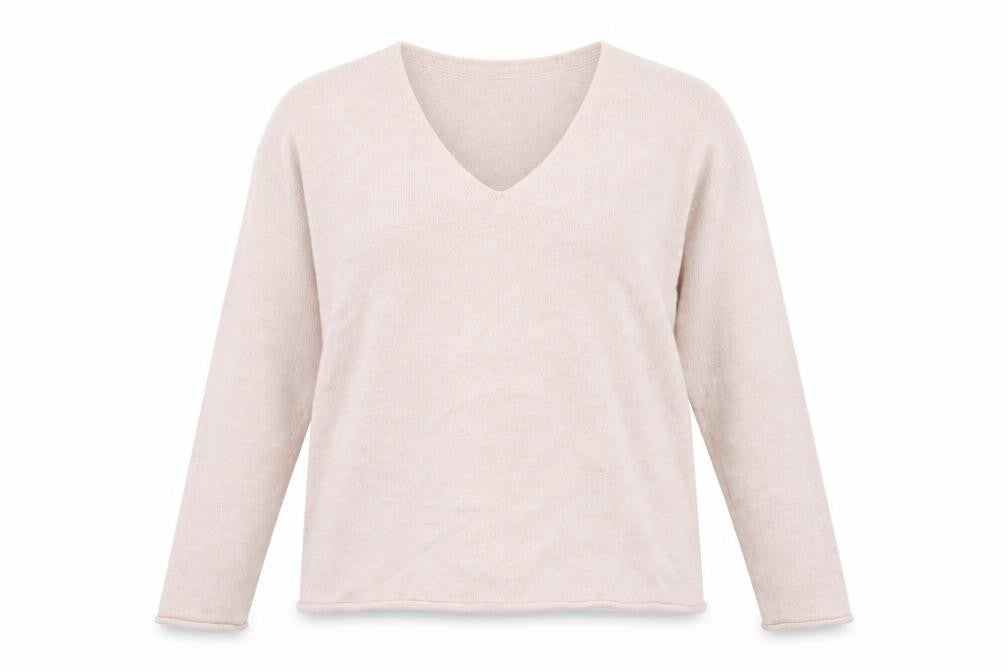 Front view of H&M women’s pink jumper, size XS