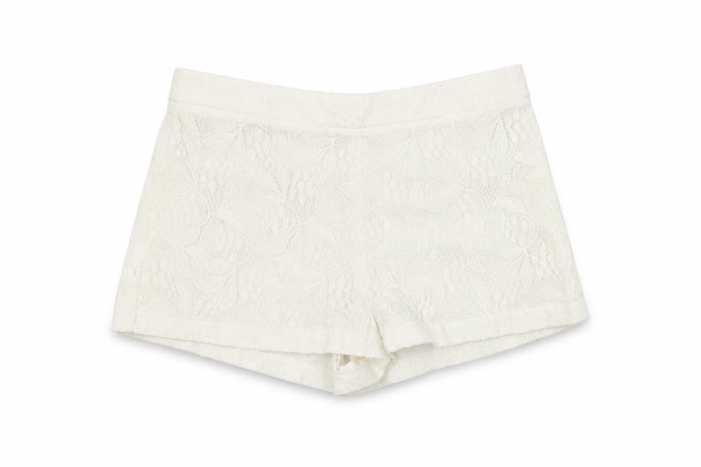 Front view of Preworn women’s white cut-off shorts, size UK 8