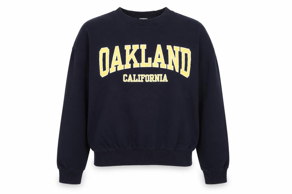 Front view of H&M women’s blue pullover sweatshirt, size XS, - oakland california