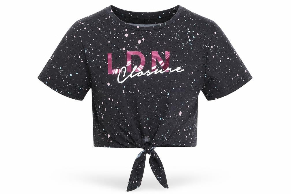 Front view of Closure girls’ black spotted basic t-shirt, size 12-13, years